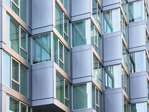 A modern building facade with many high-performance windows.
