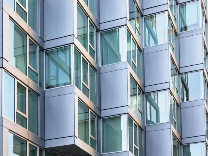 A modern building facade with many high-performance windows.