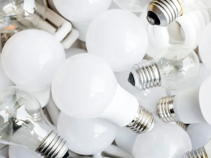 A pile of various light bulbs.