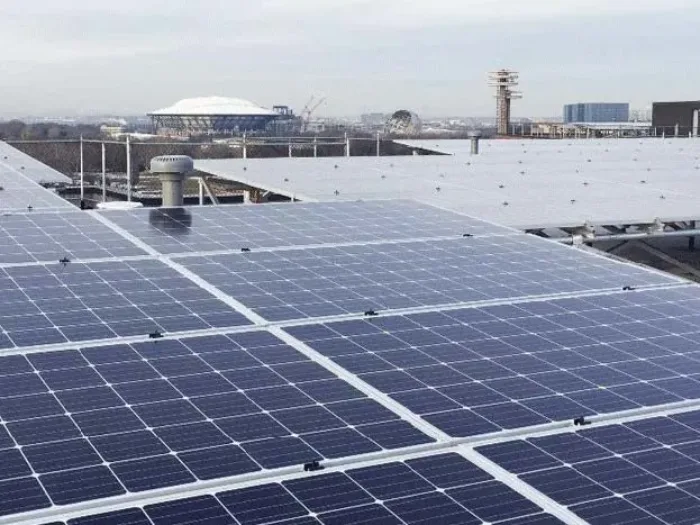 A rooftop covered in solar panels.